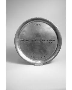 Round plate, raised rim, engraved Hebrew inscriptions in center and near rim.  Unmarked.  Diam:  360mm.