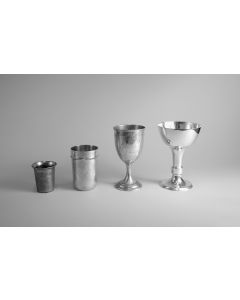 Beaker engraved with Hebrew mongram above floral sprig; one row of beading beneath rim. Marked on base. H: 100mm.
