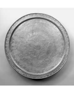 Round plate with raised rim, engarved with interlace motifs and Hebrew inscriptions.  In center, Star of David with Hebrew label "Zion."  Marked on back.  Diam:  550mm.