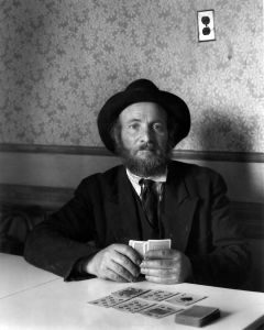 The Jewish card-player. Silver gelatin print. Signed by Abbott in mount below image.