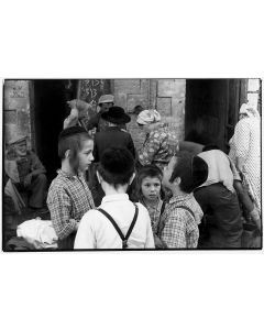 Chassidic Boys in Discussion (Jerusalem). Silver gelatin photographic image. Photographer’s hand-stamp and pencil notations on verso.