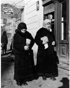 The Walk Home from the Synagogue Service. Virgin print. Signed and titled in ink and pencil by Vishniac on verso.