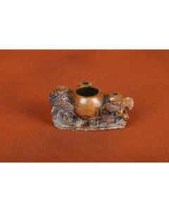 Inkwell belonging to Hyman Gratz.
 Tan-jade Chinese inkwell, carved with nautical scene surrounded by three quill-pen holders. Inscription below: “H.H. Gratz, 1841”