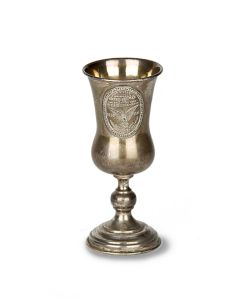 Stemmed goblet with applique oval medallion bearing portrait of the sage Don Abarbanel at front, and at rear, dedication plaque.