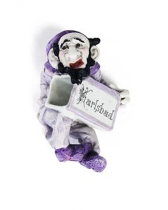 Sterotypical figure in biscuit-porcelain painted in tones of lavendar.