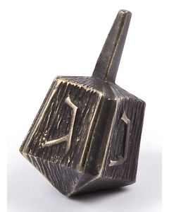 Designed by Ludwig Wolpert. Each fluted side features one of the four Hebrew letters appropriate to the traditional game. Marked along handle: “Wolpert,” Issued by the Judaica Heritage Society. Height:1.5 inches.