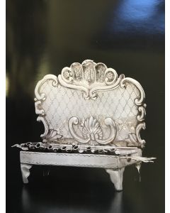 A SMALL GERMAN SILVER CHANUKAH LAMP.