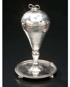 Engraved and pierced pear-shaped container with hinged lid, set on footed circular base. Height: 7 inches.