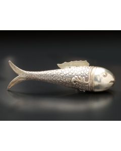 Scaled body chased with fins, detachable head. Inscribed: “R.H. Hakim, 3-12-1912.” Length: 7 inches.
