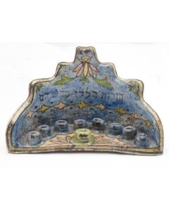 Semicircular tiered backplate fronted by nine candle holders; the whole decoratively hand-painted under glaze. 6 x 10 inches.