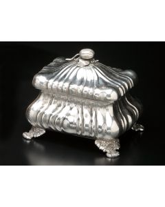 Rectangular-form in the baroque style, the whole fashioned in a rhythmic fluidity of line, hinged lid with fruit finial on leafy setting, the whole set on four lavish supports. Marked. 5 x 5.5 x 4 inches.