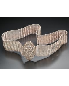 Buckle with chased Hebrew verse: “Before God, purify yourself.” Length: 31 inches.