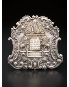 Cartouche shape, hand wrought and chased with scroll and rose border, centered by rampant lions flanking engraved Decalogue topped by crown. Suspension chain. Marked. 7.5 x 7.5 inches.