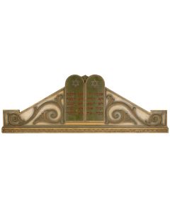 To be placed above the Ark containing the Torah Scrolls. Grandly carved, featuring central Decalogue with related Hebrew words. 26 x 72 inches.