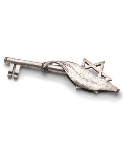 Metal key with Star of David-handle with applied silver plaques. Engraved: “Presented at the Official Opening of the Jewish Convalescent Home, Bad Harzburg, January 26th, 1947 - 117 Jewish Relief Unit, B.A.O.R.” 1.25 x 5 inches.