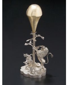 Floral bulb set on leafy stalk with lions and deer around, set on scalloped platform. Height: 7 inches.