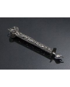 Of cylindrical form with continuous filigree work through knob finial, terminating with hand and extended finger. Marks: KP. Assay master: Anatoly Apollonovich Artsybashev. Silver standard mark: 84. Length: 4.75 inches.