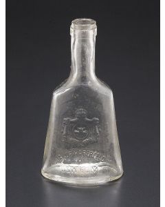 Clear glass bottle manufactured at the Jakob Haberfeld vodka and liquor factory. Decorated in relief with the family coat-of-arms and the inscription “Jakob Haberfeld, Oswiecim.” 6 x 3 inches.