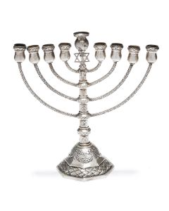 Of classic form, chased throughout with foliate and garland motifs; central shaft with flame finial, the whole set on raised octagonal dome. With removable servant light set with prominent Star-of-David. Marked: Halbmond und Krone. 8 x 7.75 inches.