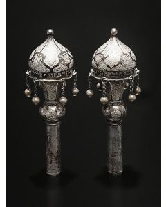 Of bulbous form, hung with pendant bells; Chased and engraved throughout in alternating arabesque motif of foliate scrollwork. Inscribed with Hebrew characters. Marked. Height: 6 inches.