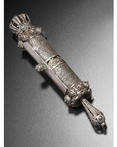 Elaborate decorative filigree style with bosses surround, with coronet finial and spindle; thumb piece marked “Bezalel Jerusalem.” Scroll: Manuscript on thin vellum in an Aschkenazic hand. Height: 6 inches.