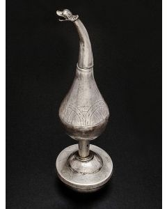 Pomander-form, etched, with screw-top lip, and gargoyle-like head finial. Set on round foot with coordinating etched patterning. Marked Height: 7.5 inches.