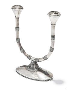 Elegant broad U-shaped candelabrum on oval base applied with filigree. 9 x 7.5 inches.