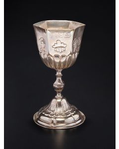 Hexagonal bowl with chased floral design motif; with faceted baluster stem set on circular base with coordinating chasing. Along the edge of bowl the Hebrew word: “Pesach.” Marked. Height: 5.75 inches.