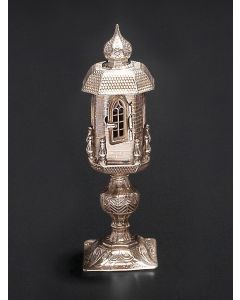 Turret-like spice chamber with cathedral windows and balcony spindles, features onion-dome finial on roof. Set on engraved knop stem and square base. Hinged door. Marked: “12.”Height: 6 inches.