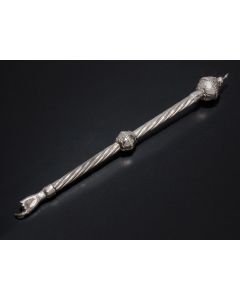 Spiral fluted shaft with center ball knop. Ornamented with large, pierced orb finial with ring; terminating in hand with extended pointed finger. Marked. Length: 12 inches.