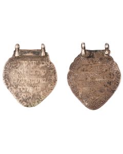 Each: Shield-form plaque with two suspension loops, engraved in Hebrew characters with names of angels and kabbalistic phraseology, including “Destroy Satan!” 3 x 2.25.