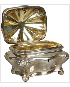 Of Rococo style, with hinged lid and set on four ball supports. With dated German inscription. Marked. 7 x 4.5 inches (18 x 12 cm).