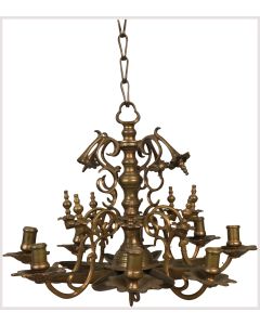 Of elaborate design: From central bulbous shaft hangs traditional eight-channeled Judenstern. Eight candle-holders below supported by elaborate branches, with decorative floral tendrils above. Height 14.5 inches (36 cm).