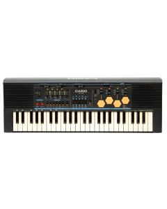 Casio, c. 1985, labeled CASIOTONE MT-500/CASIO COMPUTER CO., LTD. MADE IN JAPAN, 49 keys, drum pads, drum sounds, rhythm and instrument keys.