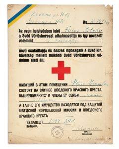 Swedish Protection Sign. Printed on card in Hungarian and Russian with manuscript additions. With colors of the Swedish flag and Red Cross at center. Ink stamp below of Swedish Red Cross in Hungarian and Swedish.