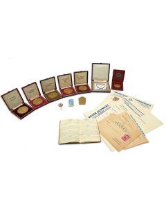 Group of medals awarded to the Austrian-Jewish athlete Gerda Gottlieb. <<*>> With: Personal Diary, 1936-37. Extensive manuscript in German. <<*>> Sporting pins (3). <<*>> Related letters in German from sports organizations.