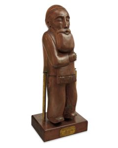 Praying rabbi set on a pivot, the base of which has an applied brass plaque engraved in [broken] Yiddish and English: “How did he pray.” The figure repeatedly bows when pushed. Height: 19.5 inches. American, c. 1950.