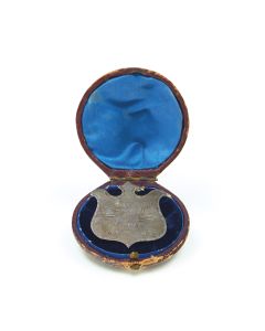 Silver pin inscribed: "Cong. Shaaray Tefila Choir 5635-1875."