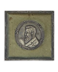 Featuring the founder of the Zionist Movement Theodor Herzl in profile, and titled with his name in Latin and Hebrew letters. Set within original frame. 3 x 3 inches (7.6 x 7.6 cm).