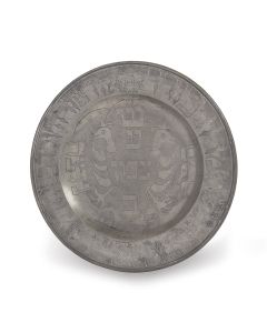 The shallow base engraved with armorial of a double headed bird, with the Order of the Passover Seder service lavishly engraved in Hebrew. Top of rim with owner’s monogram and date of 1719. Marked “HWB 1705.” Diam: 35 cm (14 inches).