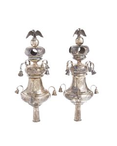 Baluster form with two tiers of bells, panels of floral chasing with large stylised crown finials capped by an eagle.