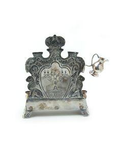 Crafted by M. Charlop. Rectangular base with eight oil holders. Backplate chased in royal design featuring Menorah at center. The whole set on four decorative feet. Signed. 9.5 x 7 inches (24 x 18 cm).