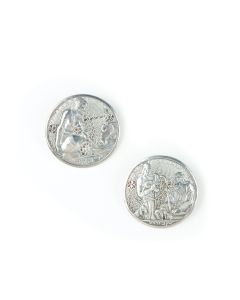 Biblical scenes. One featuring Rebecca at the well; second featuring Jacob and Rachel, with respective captions in Hebrew. Each set against stylized filigree. Each fitted with pin on reverse. Marked. Diam: 1.5 inches (4.2 cm).