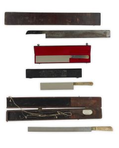 Collection of four Shechitah knives (Chalif). Two housed in custom wooden cases, and two housed in custom cases marked “Schmotzer Janos, Budapest.” Length of knives: 19 and 12 inches.