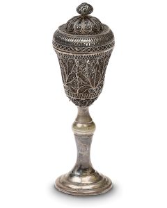 Bulb-form filigree spice chamber with detachable domed roof surmounted by finial; the whole resting on stem terminating in circular, stepped platform. Height: 5 inches. Minor puncture.