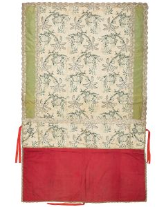 Woven chartreuse silk fabric brocade with colored and metallic thread, trimmed with silver lace ribbon featureing floral, palm tree and pagoda motifs. With a later crimson brocade panel with red ties. Linen-backed. 63.5 x 38.5 inches.