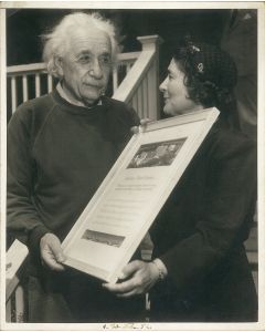 (Physicist and Noble Prize winner. 1879-1955). Portrait photograph signed: “A. Einstein 52.”