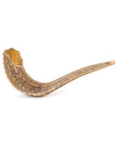 Of traditional form, with elaborate Hebrew decorative etching relating to the New Year: “With a great Shofar he should sound” and “Praise Him with the call of the Shofar.” Length: 14 inches.