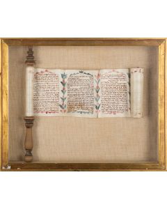 Illuminated manuscript Esther Scroll, written on vellum, in an Aschkenazic hand. Each column of text surrounded by pink and green flora with alternate foliate motif. Set on wooden turner. Handsomely mounted within wooden shadow box.