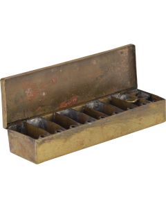 Small rectangular form with hinged lid revealing row of eight receptacles with spouts and ninth receptacle for the removable servant light. 0.75 x 4 x 1 inches (1.9 x 10.2 x 2.5 cm).